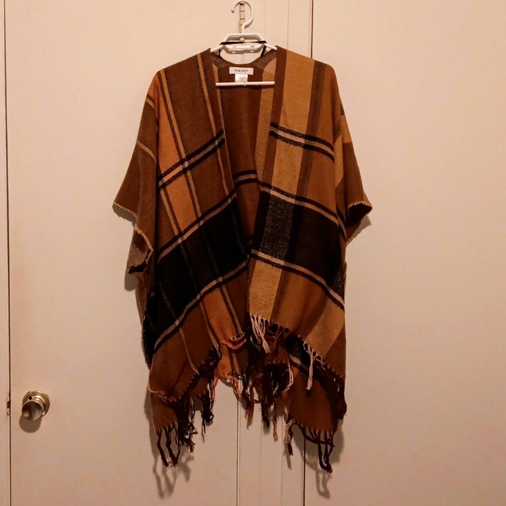 Earth-toned plaid shawl with tassels